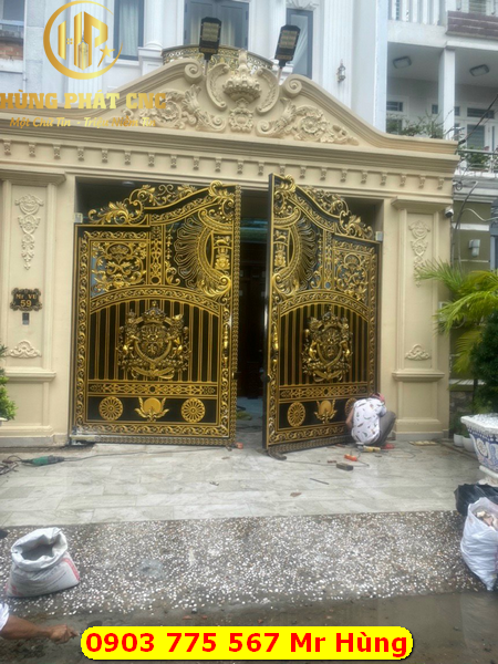 Làm cửa cổng nhôm đúc quận 9 